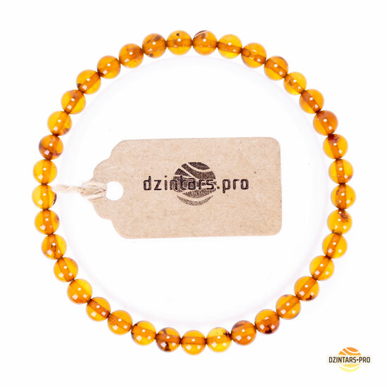 Lodes formas konjaka krāsas pulētā dzintara sieviešu aproce