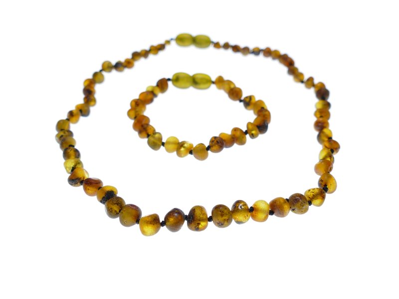 Komplekts - dzintara krelles un aproce