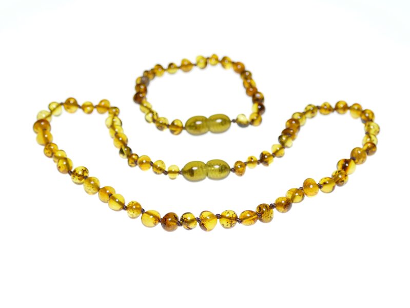 Dzintara krelles un aproce bērnam no citronzaļās krāsas Baltijas dzintara