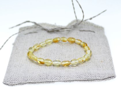 Pupiņu formas citrona krāsas pulētā dzintara aproce bērniem