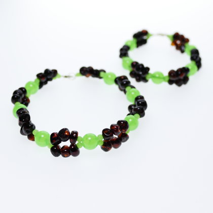 Два светящихся в темноте браслета из янтаря и люминисцентных бусин