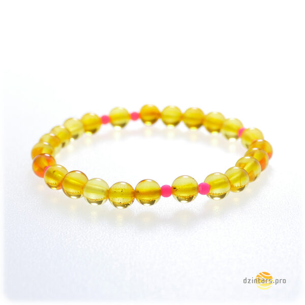 Smalka rokassprādze no citrona krāsas dzintara un rozā akrila pērlītēm