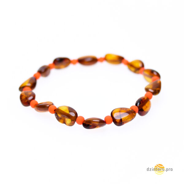 Pupiņu formas konjaka krāsas dzintara pērlītes un spilgtas oranža akrila pērlītes