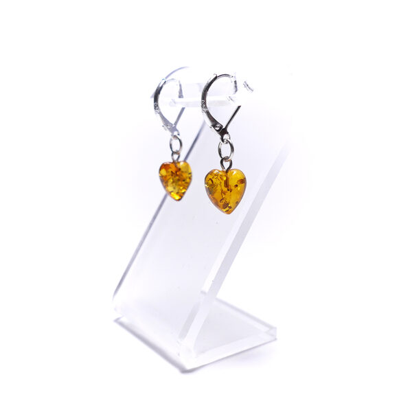 Minimalist heart-shaped earrings with honey-colored amber
